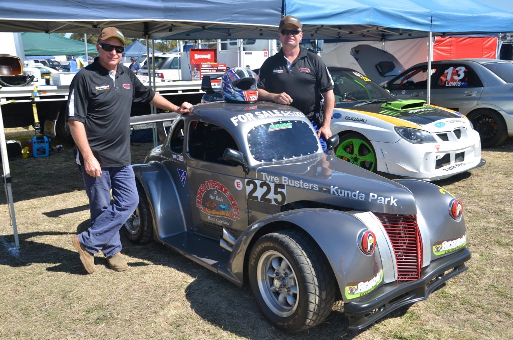 PUNCH BUGGY: Peter Bridson and Troy Perrins prep their bug for the day's events. 